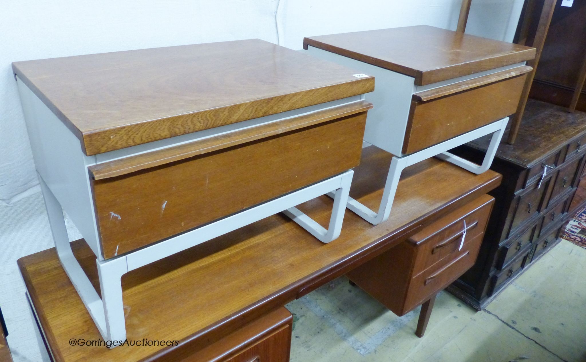 A pair of mid century design teak bedside cabinets, width 61cm, depth 44cm, height 48cm